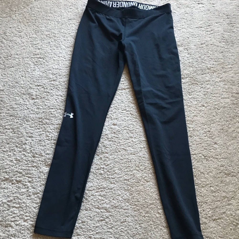 Woman’s UA running tights.